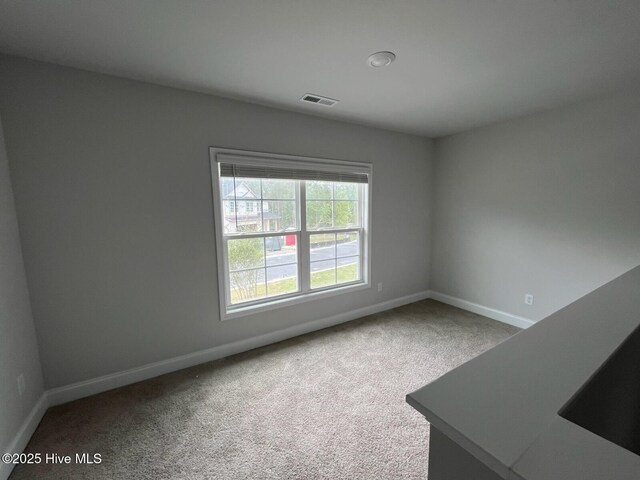 1224 Mandevilla Dr SE, Bolivia, NC 28422 - carpeted empty room with baseboards