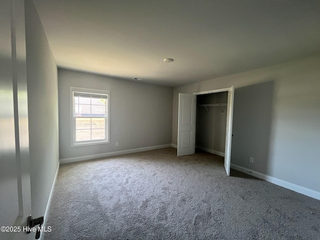 1224 Mandevilla Dr SE, Bolivia, NC 28422 - unfurnished bedroom featuring carpet, baseboards, and a closet