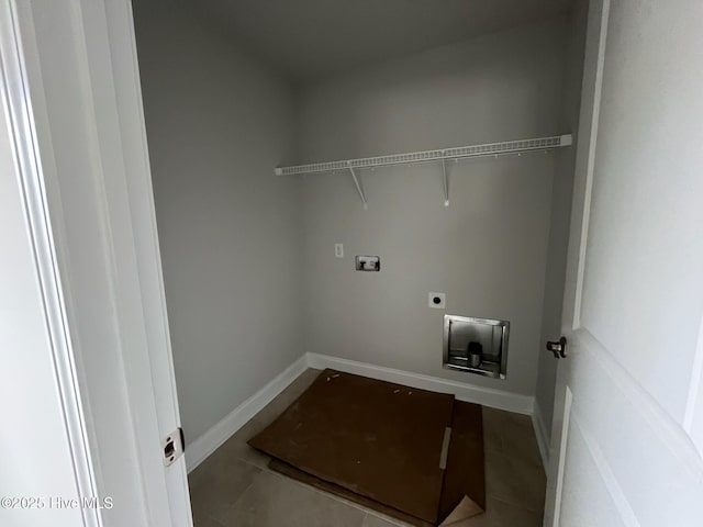 1224 Mandevilla Dr SE, Bolivia, NC 28422 - laundry area with hookup for an electric dryer, hookup for a washing machine, tile patterned floors, and baseboards