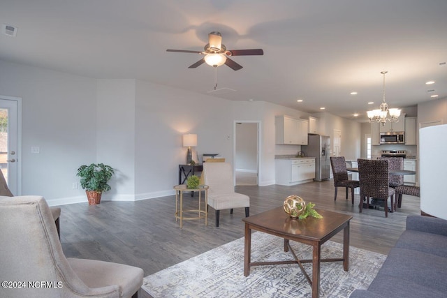 1224 Mandevilla Dr SE, Bolivia, NC 28422 - living room featuring a chandelier, wood finished floors, a ceiling fan, recessed lighting, and baseboards