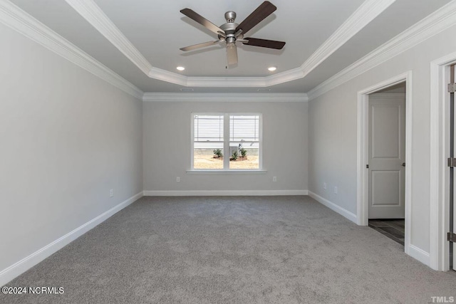 1224 Mandevilla Dr SE, Bolivia, NC 28422 - carpeted empty room with a ceiling fan, a raised ceiling, ornamental molding, baseboards, and recessed lighting
