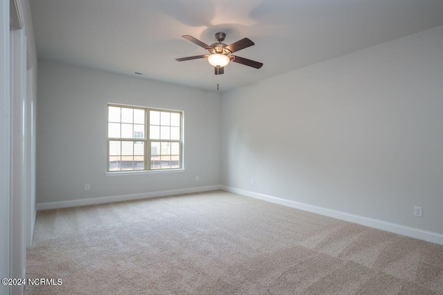 1224 Mandevilla Dr SE, Bolivia, NC 28422 - carpeted spare room featuring a ceiling fan and baseboards