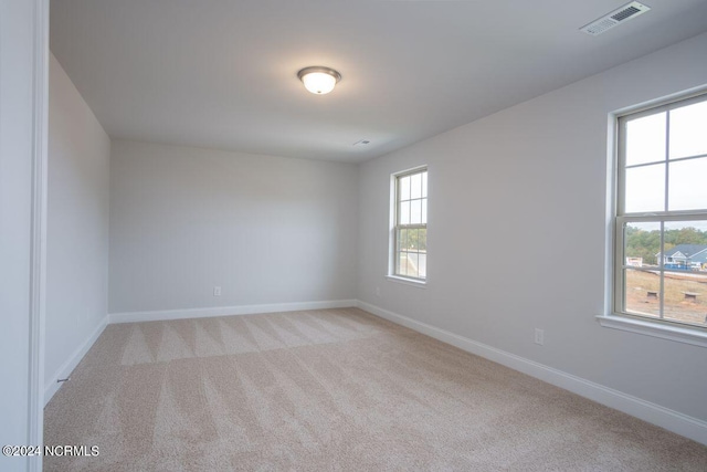 1224 Mandevilla Dr SE, Bolivia, NC 28422 - empty room with light carpet and baseboards