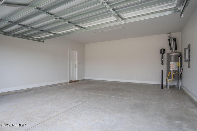 1224 Mandevilla Dr SE, Bolivia, NC 28422 - garage with water heater and baseboards
