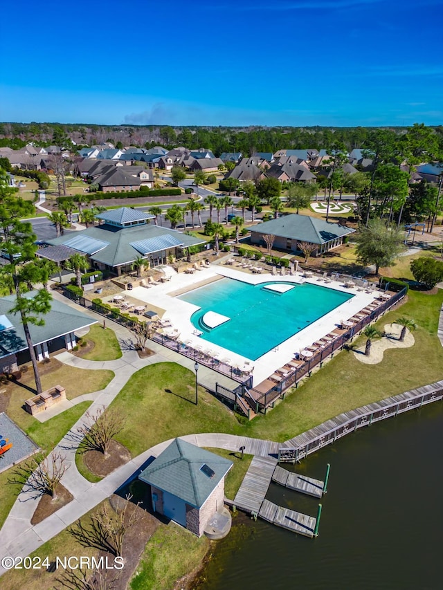 1224 Mandevilla Dr SE, Bolivia, NC 28422 - aerial view of residential area with a pool and a large body of water