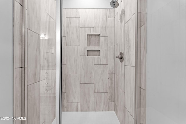 bathroom featuring a shower stall