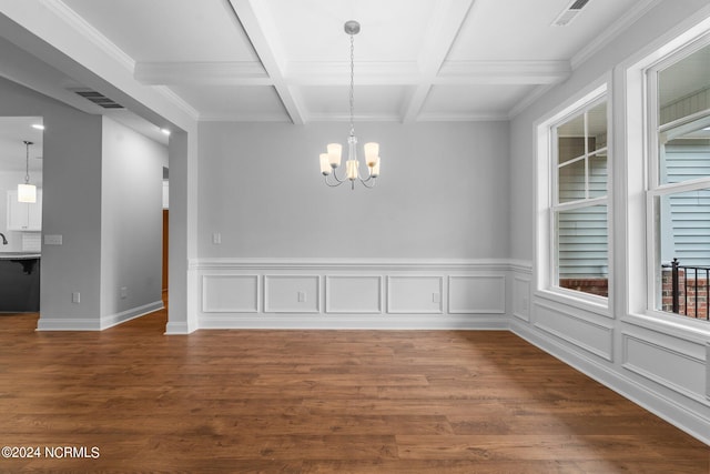 unfurnished dining area with wood-type flooring, a chandelier, crown molding, beamed ceiling, and coffered ceiling