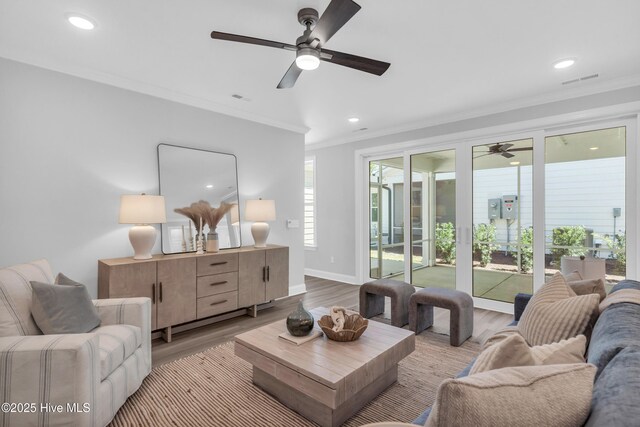 living area with light wood-style floors, recessed lighting, and ceiling fan