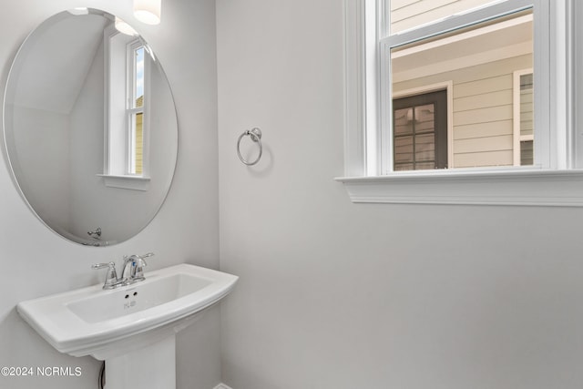 bathroom with sink and a healthy amount of sunlight