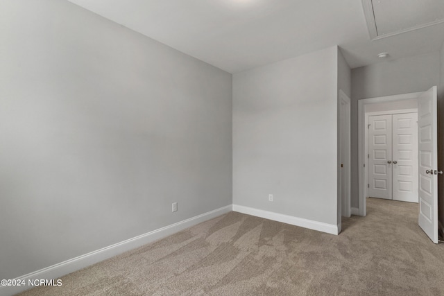 unfurnished bedroom featuring carpet