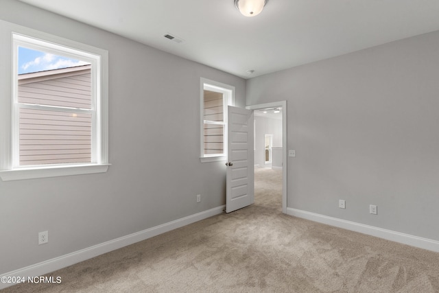 view of carpeted spare room