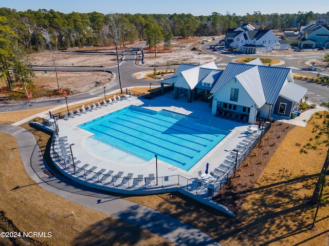 view of swimming pool with a patio