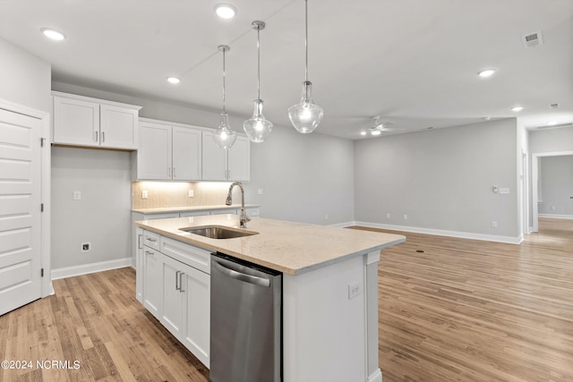 kitchen featuring ceiling fan, light hardwood / wood-style flooring, sink, and stainless steel dishwasher