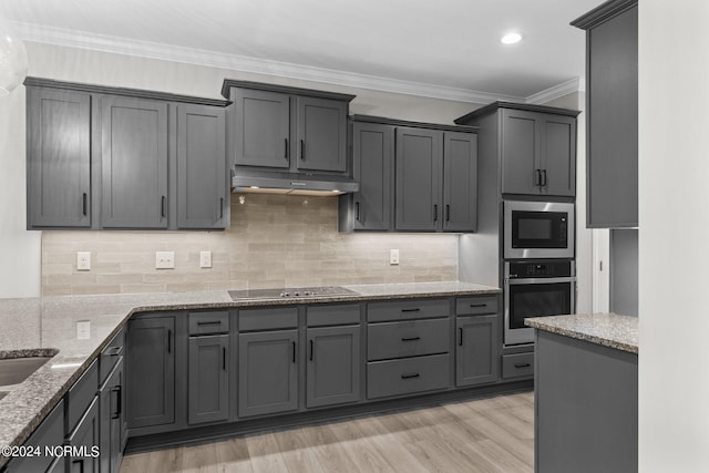 kitchen with gray cabinetry, black electric cooktop, built in microwave, light hardwood / wood-style floors, and oven