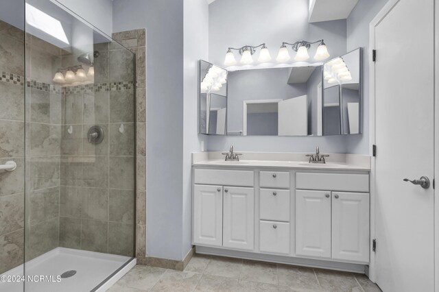 unfurnished bedroom featuring connected bathroom and light hardwood / wood-style flooring