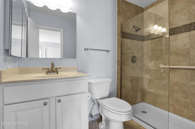 bathroom featuring an enclosed shower