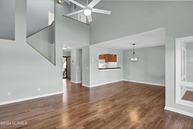 unfurnished sunroom featuring vaulted ceiling and ceiling fan