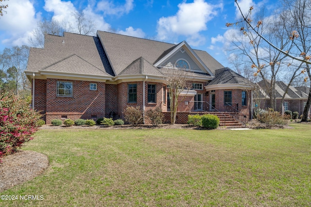 view of front of property with a front lawn