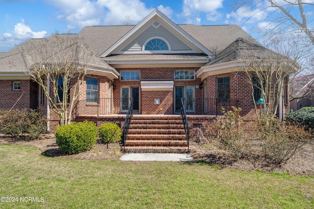 view of front of home with a front yard