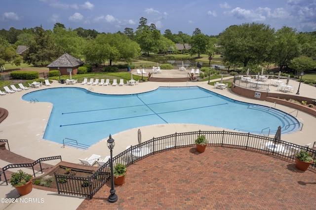 view of swimming pool featuring a patio