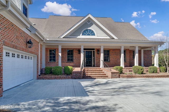 view of front of property featuring covered porch