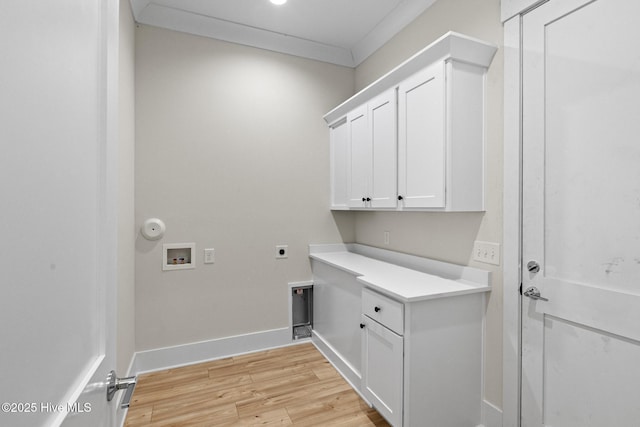 laundry area featuring cabinets, washer hookup, crown molding, electric dryer hookup, and light hardwood / wood-style flooring