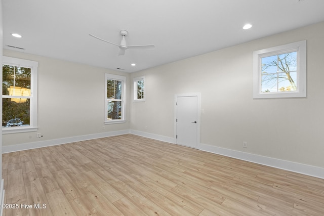 unfurnished room featuring ceiling fan and light hardwood / wood-style floors