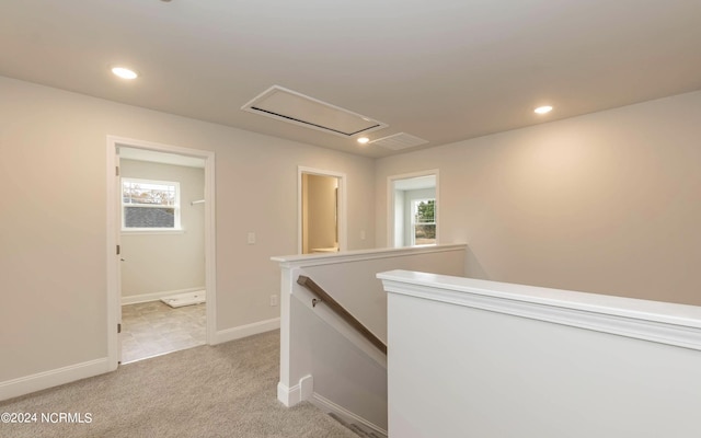 1225 Mandevilla Dr SE, Bolivia, NC 28422 - corridor with attic access, an upstairs landing, light carpet, baseboards, and recessed lighting
