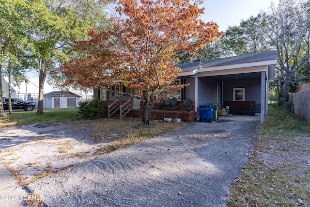 view of front of house featuring a carport