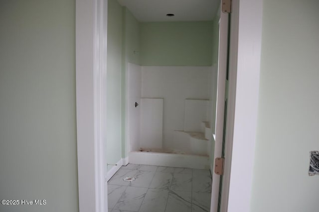 bathroom featuring marble finish floor