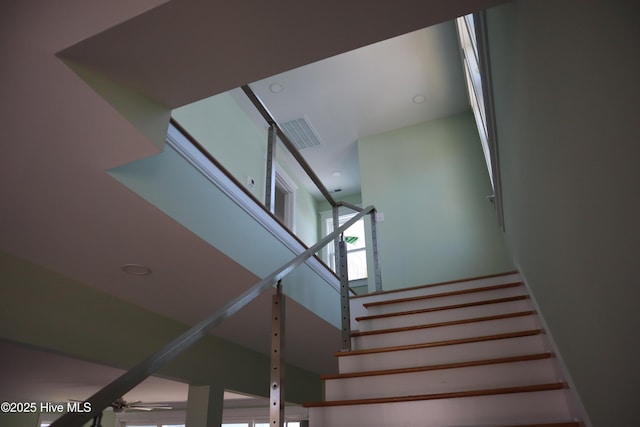 stairs featuring visible vents and recessed lighting