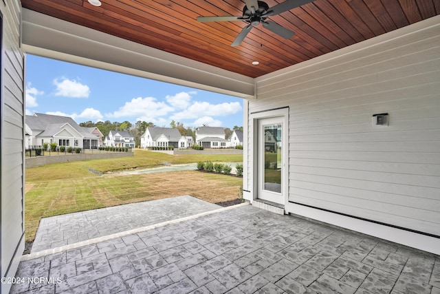 view of patio / terrace featuring ceiling fan