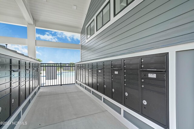 view of home's community featuring a mail area