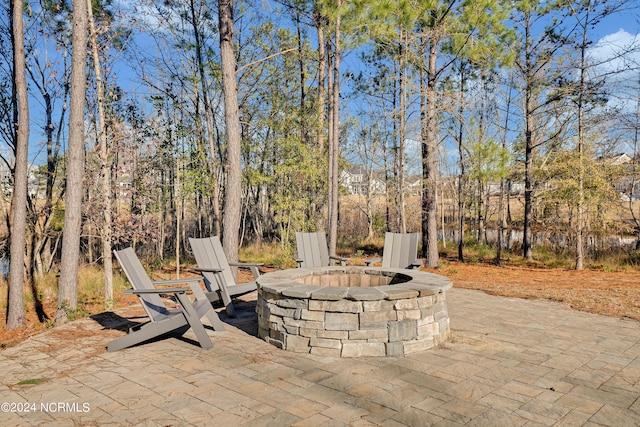 view of patio featuring an outdoor fire pit