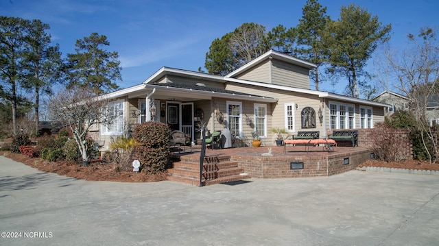 view of front facade with a patio area