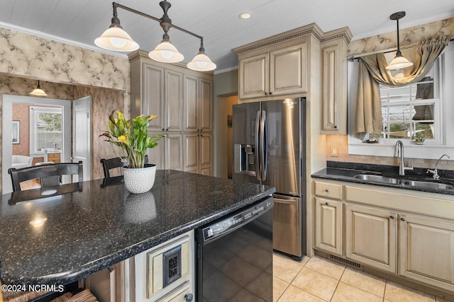 kitchen featuring dark stone counters, decorative light fixtures, sink, stainless steel fridge with ice dispenser, and black dishwasher