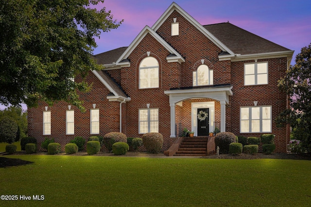4441 Lagan Cir, Winterville, NC 28590 - georgian-style home featuring a yard, brick siding, and roof with shingles