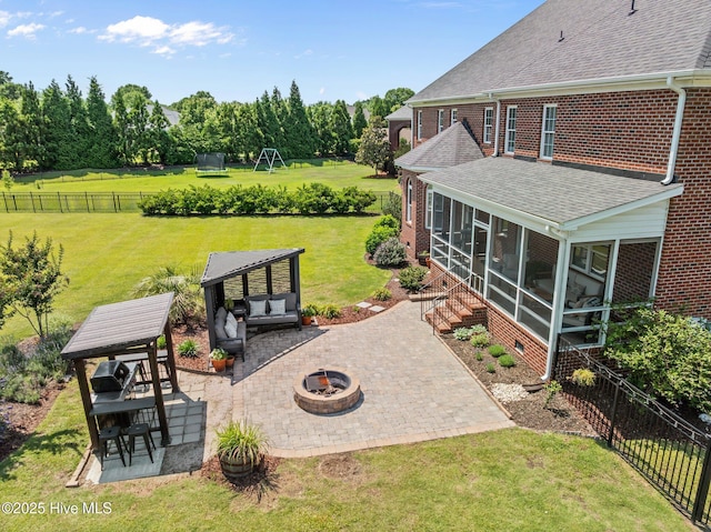 4441 Lagan Cir, Winterville, NC 28590 - view of yard with an outdoor fire pit, a patio area, a sunroom, and a gazebo