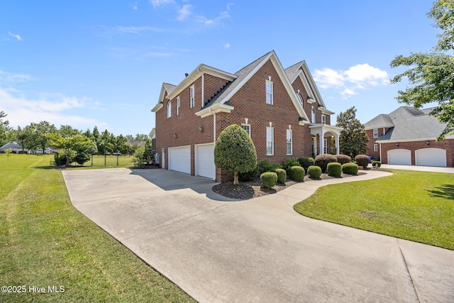 4441 Lagan Cir, Winterville, NC 28590 - view of home's exterior with brick siding, an attached garage, driveway, and a lawn