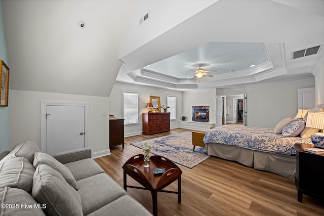 4441 Lagan Cir, Winterville, NC 28590 - bedroom featuring crown molding, a raised ceiling, wood finished floors, ceiling fan, and baseboards
