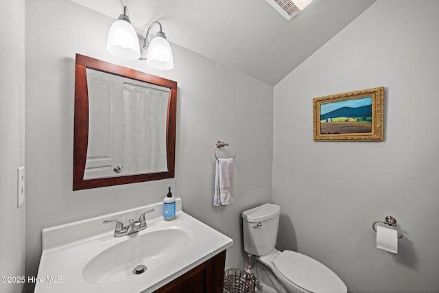 4441 Lagan Cir, Winterville, NC 28590 - bathroom featuring vanity, toilet, and vaulted ceiling