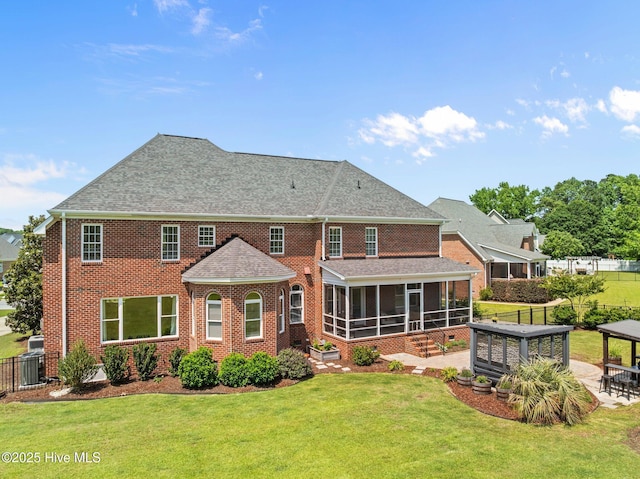 4441 Lagan Cir, Winterville, NC 28590 - back of house with a sunroom, a patio, a shingled roof, brick siding, and a gazebo