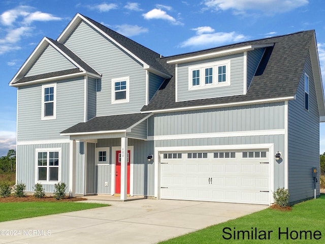 view of front of house with a garage