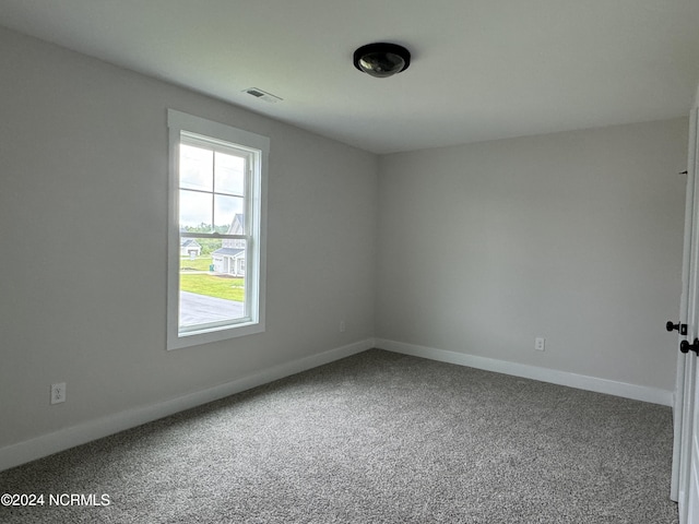 401 Bay Harbor Ct, Hubert, NC 28539 - carpeted empty room with visible vents and baseboards