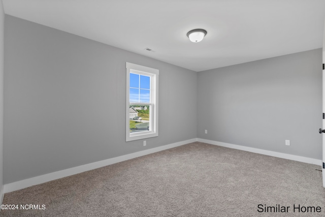 view of carpeted spare room