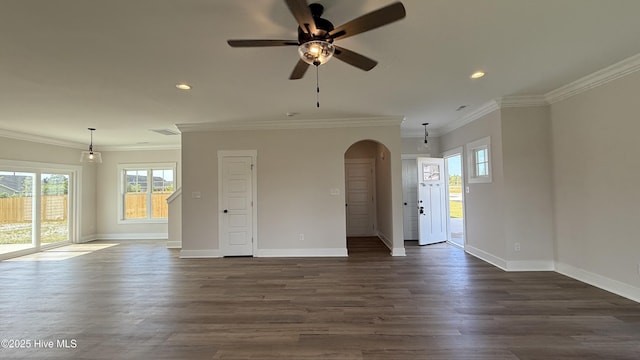 401 Bay Harbor Ct, Hubert, NC 28539 - unfurnished living room with arched walkways, a healthy amount of sunlight, recessed lighting, and a ceiling fan