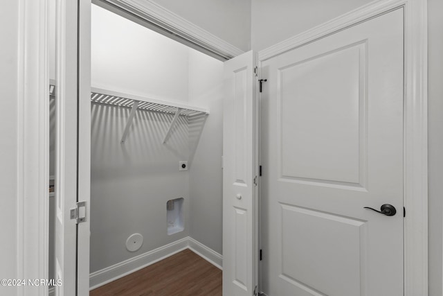 laundry area with dark hardwood / wood-style floors and hookup for an electric dryer