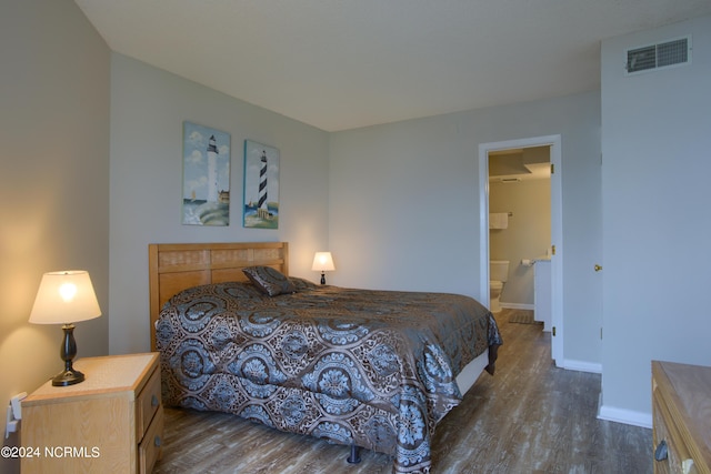 2000 New River Inlet Rd Unit 3309, North Topsail Beach, NC 28460 - bedroom featuring ensuite bath and dark hardwood / wood-style flooring