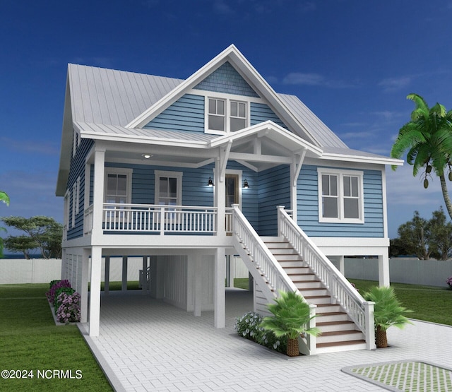 view of front of home featuring covered porch and a carport