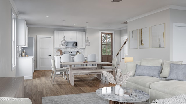 living room featuring ornamental molding and hardwood / wood-style flooring